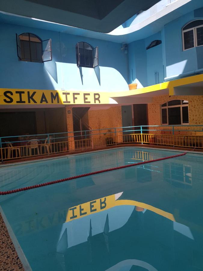 Sikamifer Quatre Bornes Bagian luar foto